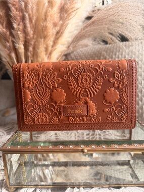 The Sak Genuine Leather Floral Embossed Willow Wallet in Cognac Brown